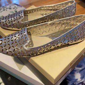 Brand new Michael Kors silver slip is size 9m